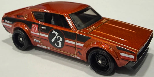 Hot Wheels 2026 - Collector # 088/250 - HW J-Imports 3/10 - Nissan Skyline 2000GT-R - Metalflake Burnt Orange - DD8 Wheels - USA '2026' Card