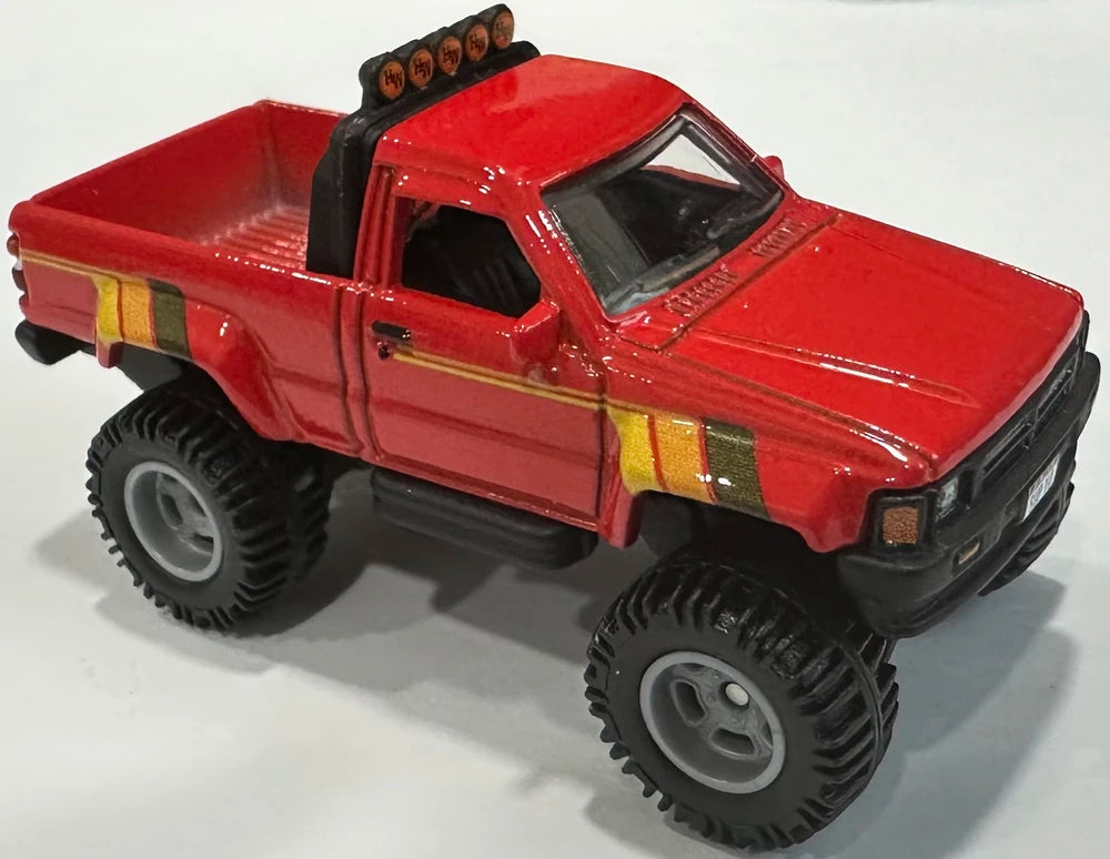 Hot Wheels 2025 - Premium / Car Culture / HW Off Road 1/5 - 1987 Toyota Pickup Truck - Red - Metal/Metal & Real Riders