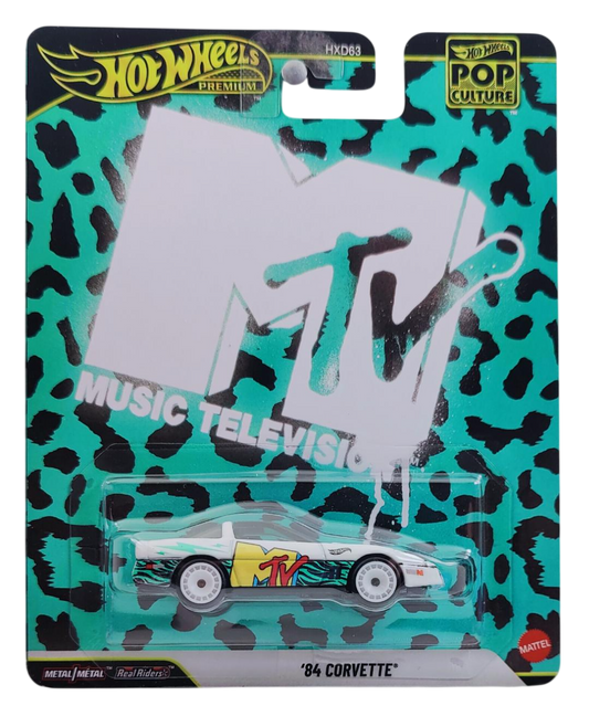 Hot Wheels 2026 - Premium / Pop Culture / Mix 2 / MTV - '84 Corvettte - White - Metal/Metal & Real Riders - Thick Blister Card