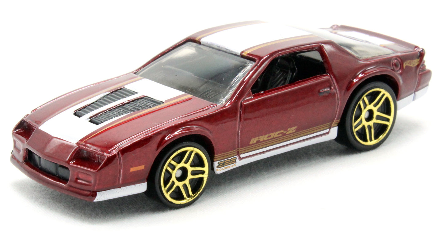Hot Wheels 2021 - Collector # 191/250 - Muscle Mania 1/10 - '85 Chevrolet Camaro IROC-Z - Maroon / White Accent Stripes - Gold PR5 Wheels - USA Card