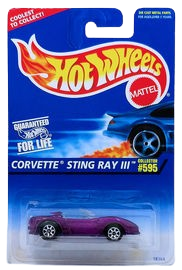 Hot Wheels 1997 - Collector # 595 - Corvette Sting Ray III - Metallic Purple - 7 Spokes - USA Blue & White Card
