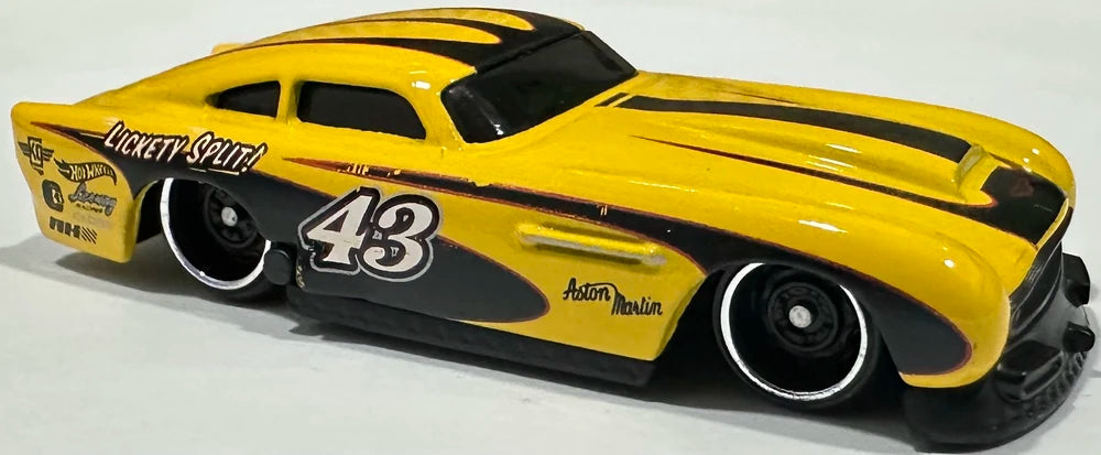 Hot Wheels 2025 - Collector # 107/250 - HW Dream Garage 3/5 - Aston Martin DB4GT High Speed Edition - Yellow / #43 / 'Lickety Split' - DD8 Wheels - International 'Aston Martin Logo' Card