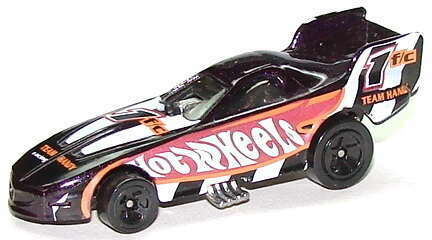 Hot Wheels 1999 - Collector # 976 - Mega Graphics Series 4/4 - Firebird Funny Car - Black - USA 'Angled' Card