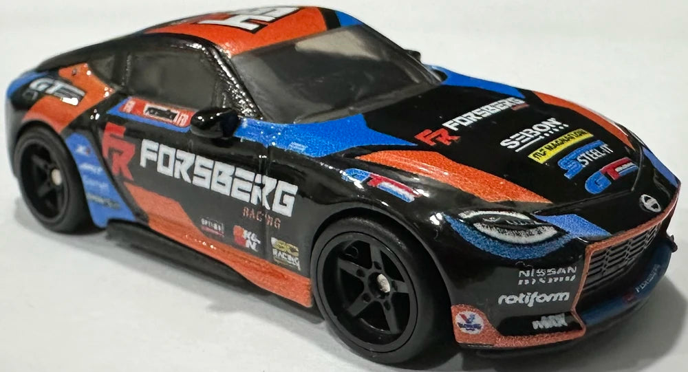 Hot Wheels 2024 - Premium / Car Culture / Slide Street 2 # 1/5 - 2023 Nissan Z - Black / Red & Blue Graphics / 'Forsberg' - Metal/Metal & Real Riders