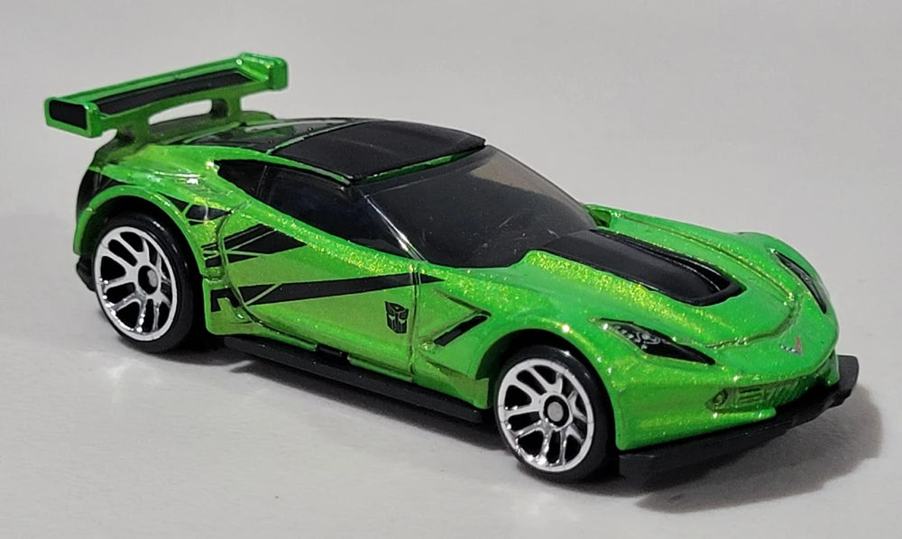 Hot Wheels 2024 - Theme Series / Transformers 2/5 - Corvette C7.R - Metalflake Green / Black Stripes - Walmart Exclusive