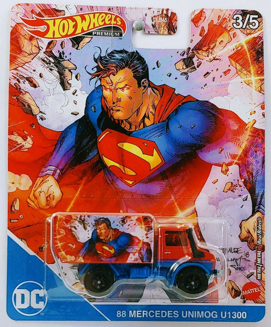 Hot Wheels 2021 - Premium / Pop Culture / DC Comics 3/5 - 88 Mercedes Unimog U1300 - Red / Superman - Metal/Metal & Real Riders