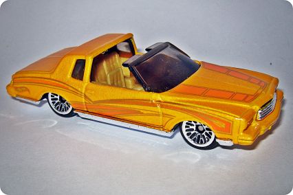 Hot Wheels 2001 - Collector # 035/240 - First Editions 23/36 - Montezooma (Monte Carlo) - Pearl Dark Yellow - LW Wheels - USA 'Race & Win' Card