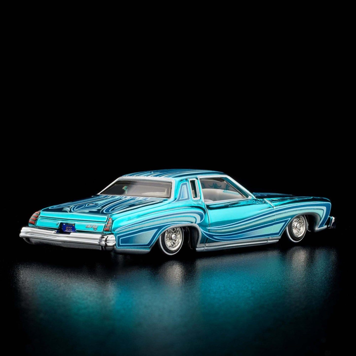 Hot Wheels 2024 - HWC/RLC Exclusive - 1975 Chevrolet Monte Carlo (Lowrider) - Spectraflame Teal - Metal/Metal - Real Riders - Adjustable/Posable Suspension - Acrylic Display Case
