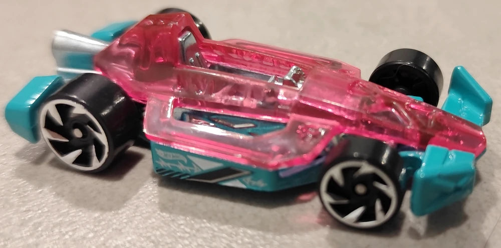 Hot Wheels 2025 - Collector # 084/250 - X-Raycers 5/10 - Arrow Dynamic - Transparent Pink Top over Aqua Base - RAV6 Wheels - USA 'Let's Race' Card