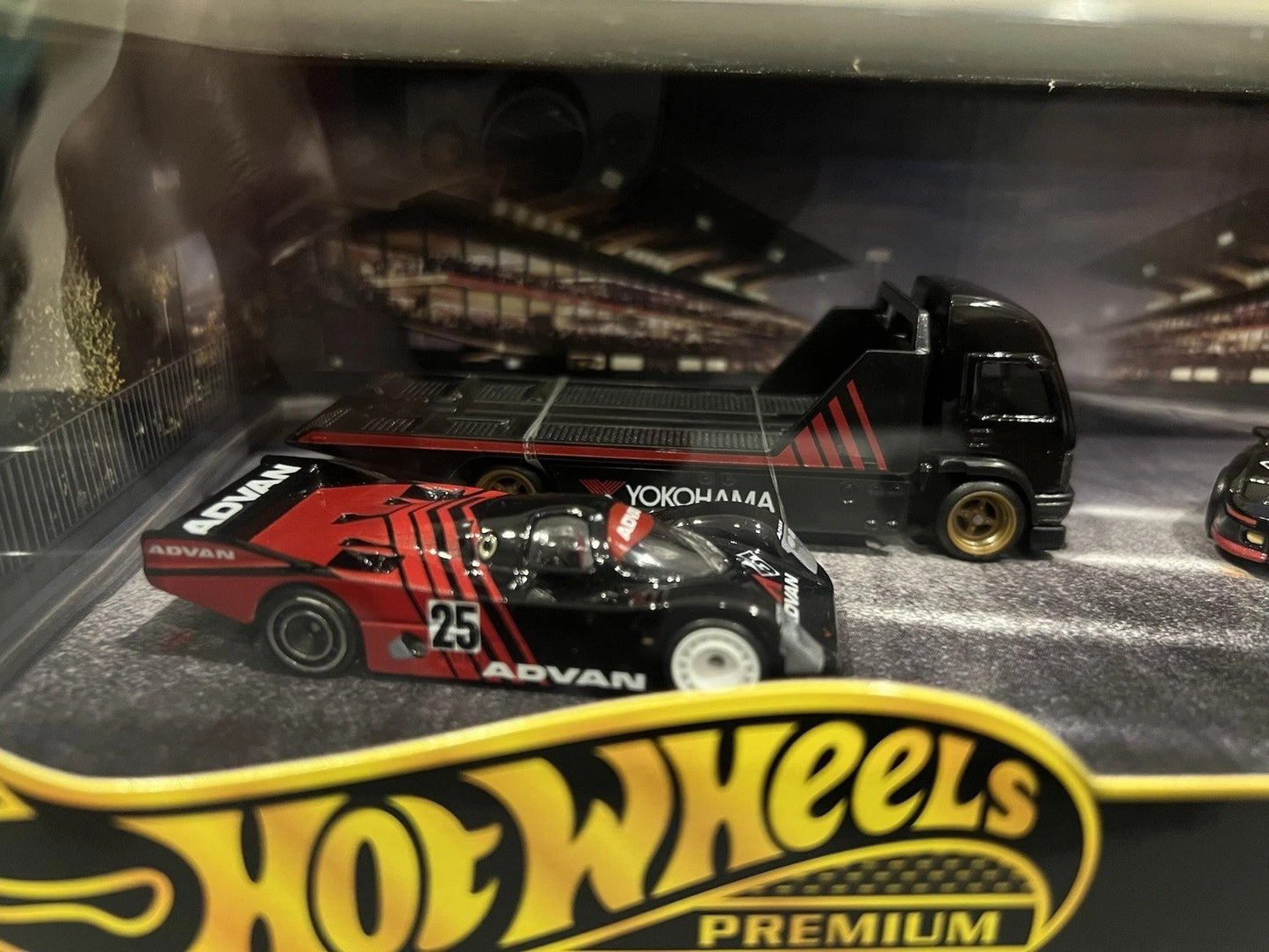 Hot Wheels 2025 - Premium Collector Set / Diorama / ADVAN - Aero Lift, Porsche 962, Nissan Skyline 2000GT-R LBWK & 1995 Toyota MR2 TRD 2000 GT - Black Vehicles with ADVAN Graphics - Metal/Metal & Real Riders - Display Box