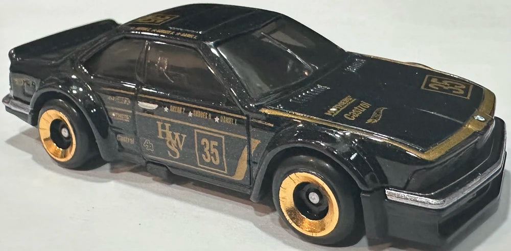 Hot Wheels 2025 - Collector # 185/250 - Wild Widebody 1/5 - New Models - BMW 635 CSi - Black / #35 - Gold L4 Wheels - International Card