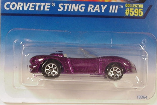 Hot Wheels 1997 - Collector # 595 - Corvette Sting Ray III - Metallic Purple - 7 Spokes - USA Blue & White Card