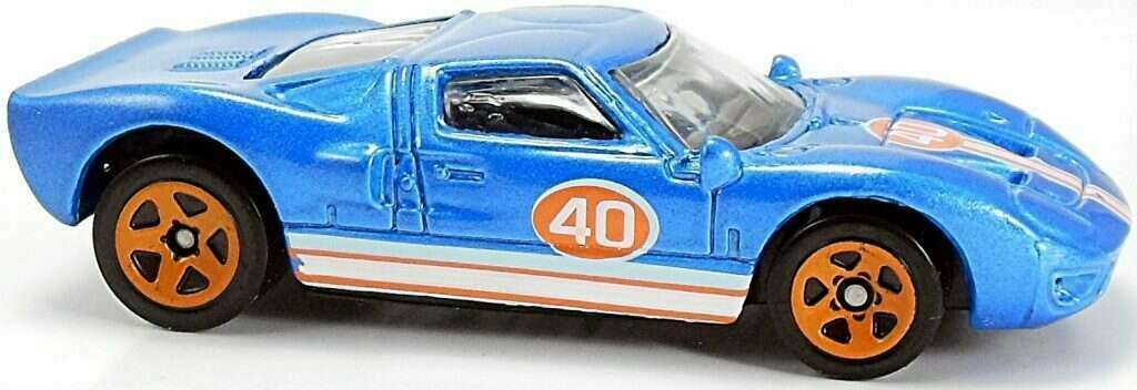Hot Wheels 2008 - Collector # 095/196 - Web Trading Cars 019/024 - Ford GT40 - Metallic Blue - Light Blue, White & Orange Stripes on Hood & Sides. Also a #40 - USA