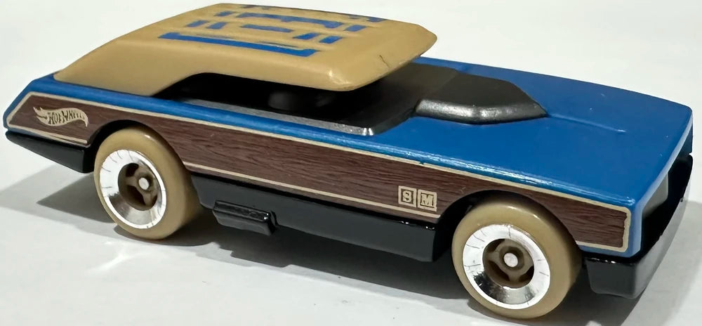 Hot Wheels 2025 - Collector # 135/250 - HW Art Cars 9/10 - Long Bloc - Egyptian Blue / 'E' on Tan Roof - International Card