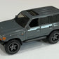 Hot Wheels 2021 - Collector # 226/250 - HW Hot Trucks 7/10 - New Models - Toyota Land Cruiser 80 - Gray - Baja5 Wheels - Smoke Windows - Black Interior - Black Plastic Base - USA Card