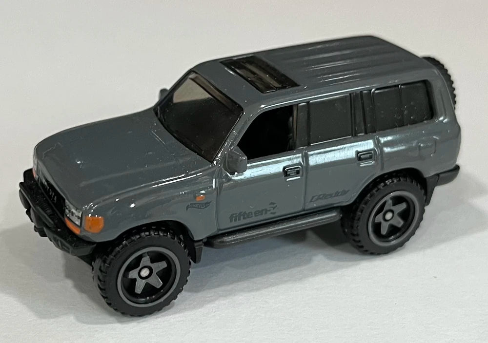 Hot Wheels 2021 - Collector # 226/250 - HW Hot Trucks 7/10 - New Models - Toyota Land Cruiser 80 - Gray - Baja5 Wheels - Smoke Windows - Black Interior - Black Plastic Base - USA Card