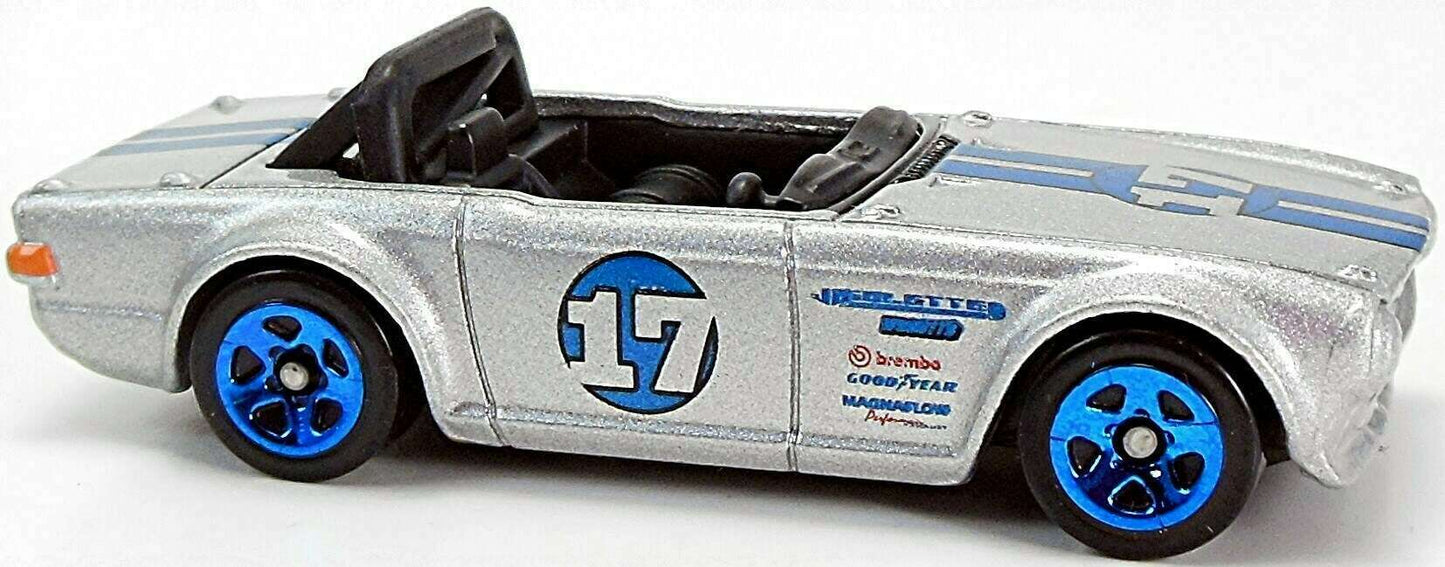 Hot Wheels 2009 - Collector # 033/166 - HW Premiere 33/42 - Triumph TR6 - Metalflake Silver / Blue Stripes / #17 - International Card