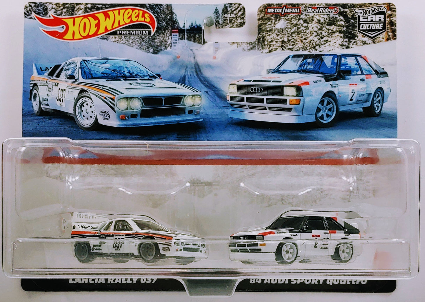 Hot Wheels 2022 - Premium / Car Culture - 2 Pack / Mix 2 - Lancia Rally 037 & '84 Audi Sport Quattro - White / Racing Graphics - Metal/Metal & Real Riders - Large Display Blister Card